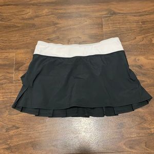 Lululemon Pace Setter Skirt Black and light Pink Size 6